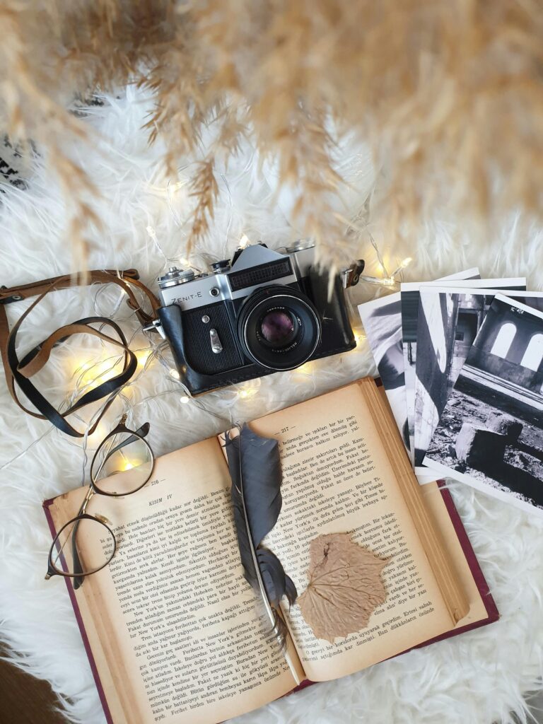 Book with camera and photos that tell a story